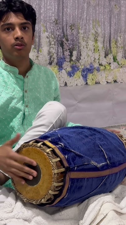 Rishi practicing mridangam